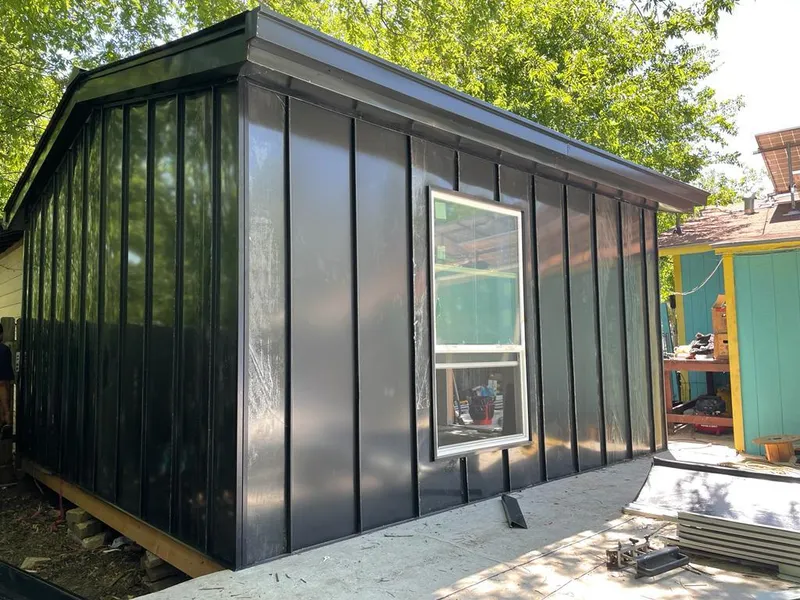 Black standing seam metal wall panels for Metal Roof Installation in Sidney